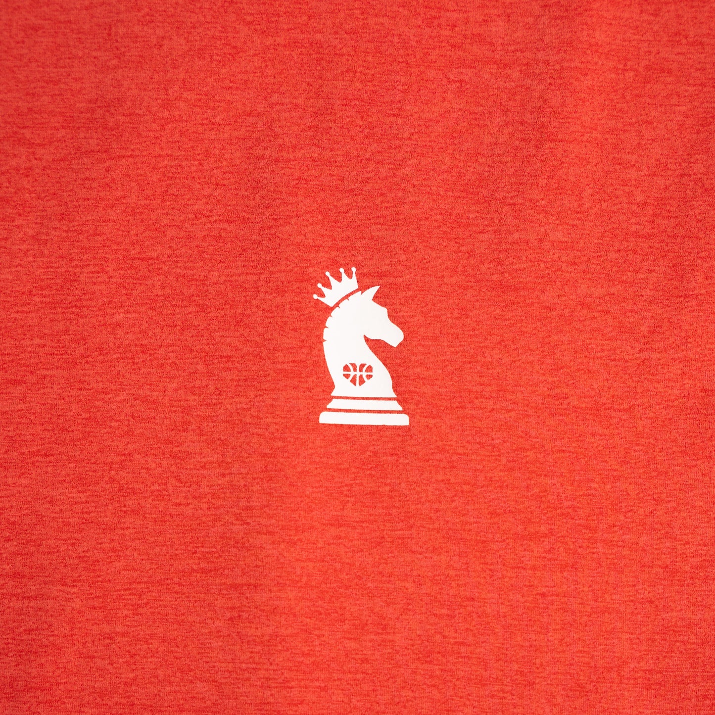 Red shirt with a white chess knight logo on a red background