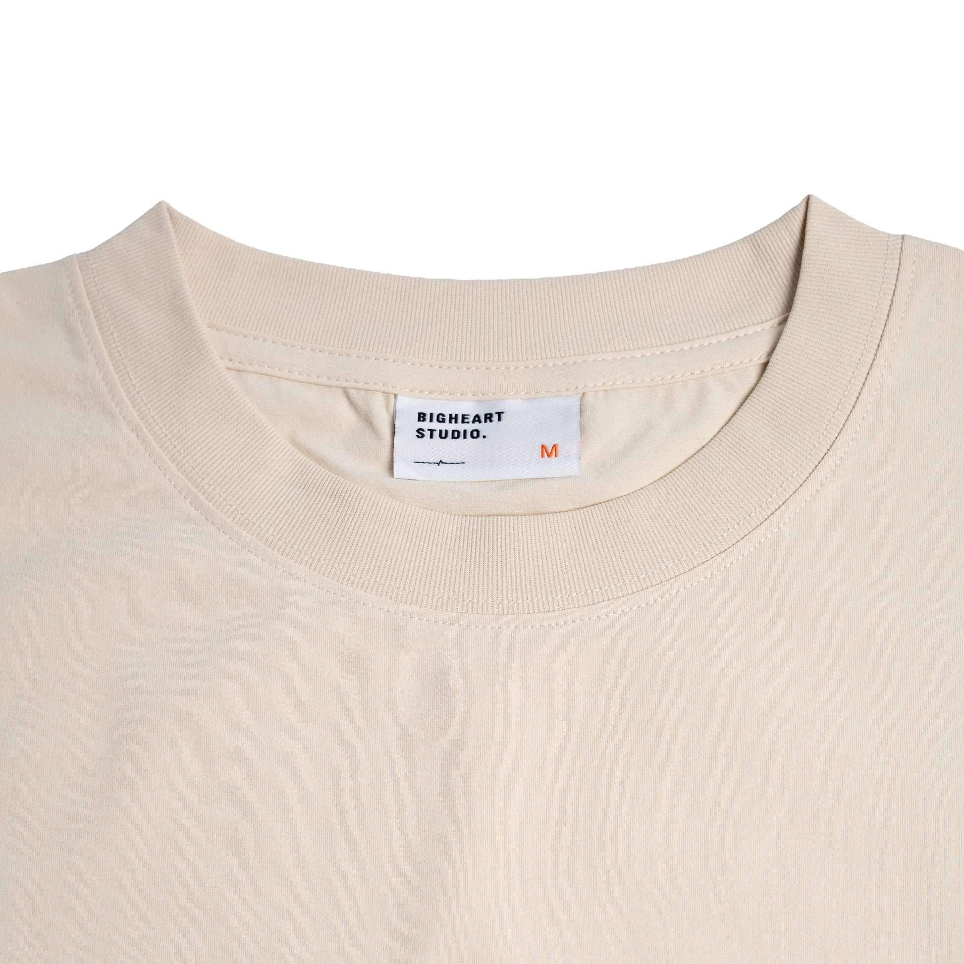 Ivory t-shirt with a black chess piece design and a visible brand label on a white background